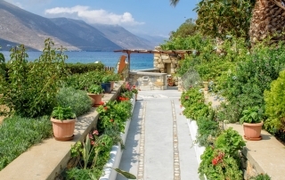 Levrossos Beach Apartments garden towards the beach